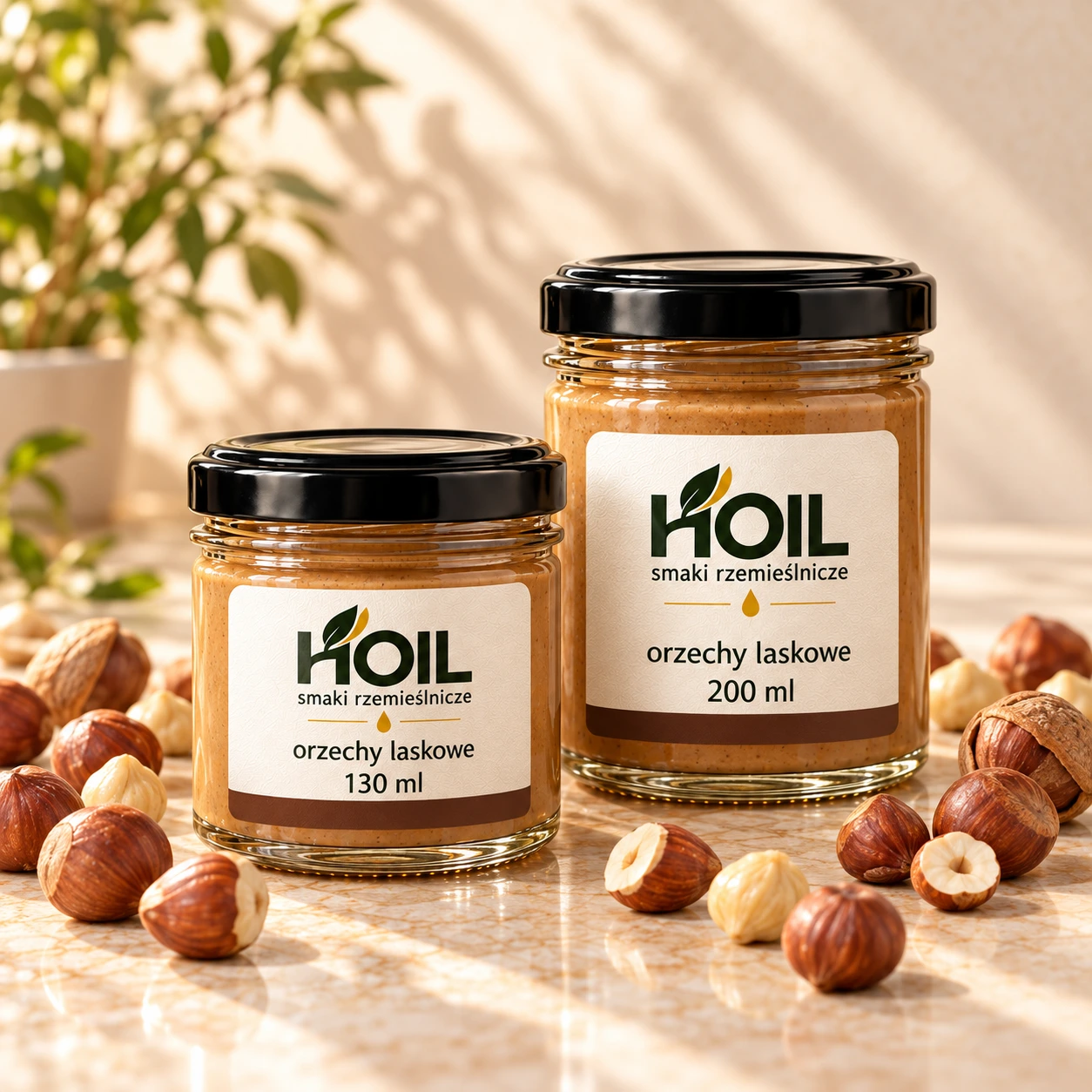 HOIL — pasta z orzechów laskowych, słoiczki 130 ml i 200 ml z rozsypanymi orzechami
